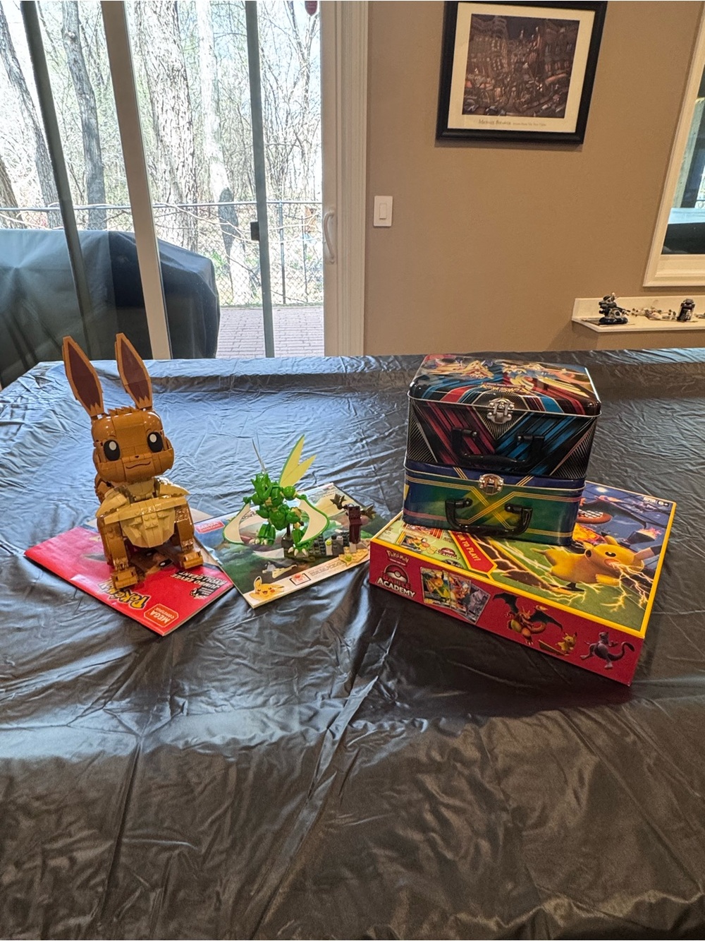 LEGO-style Eevee Building Set with Green Dragon and Themed Tin